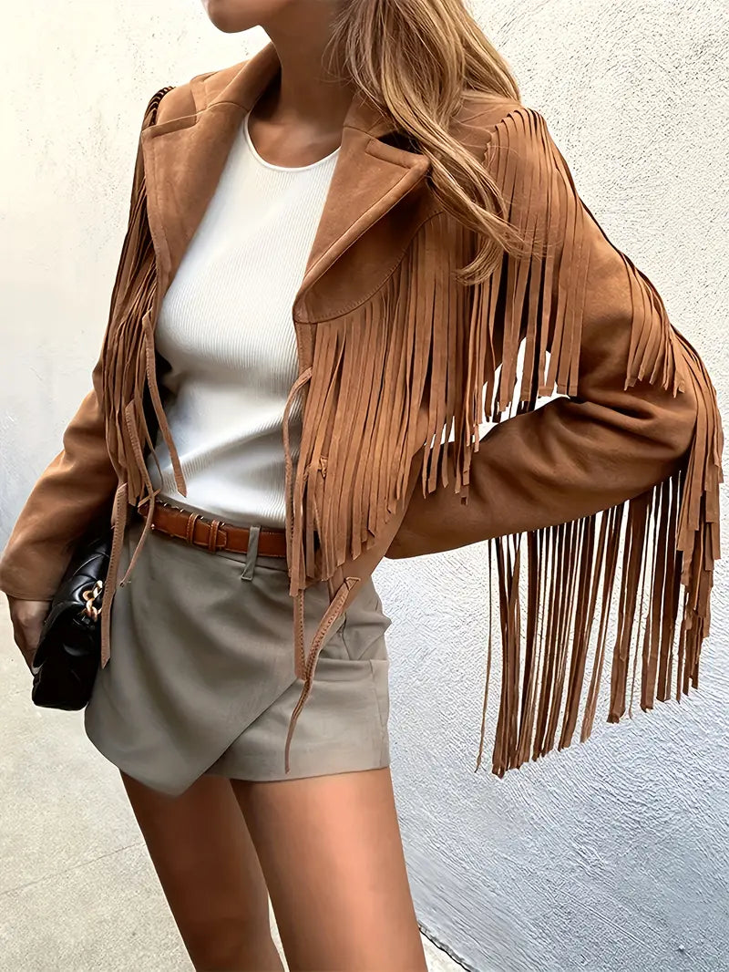 Giacca donna con frange lunghe e colletto a revers, stile bohémien. Ideale per un look moda unico.