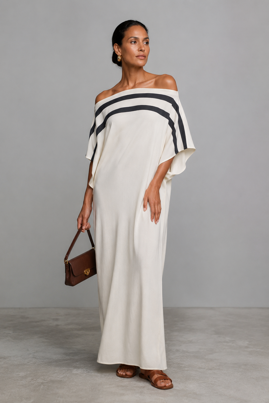 Abito maxi fluido da donna elegante, perfetto per look estivi leggeri e raffinati. Moda femminile chic e confortevole.