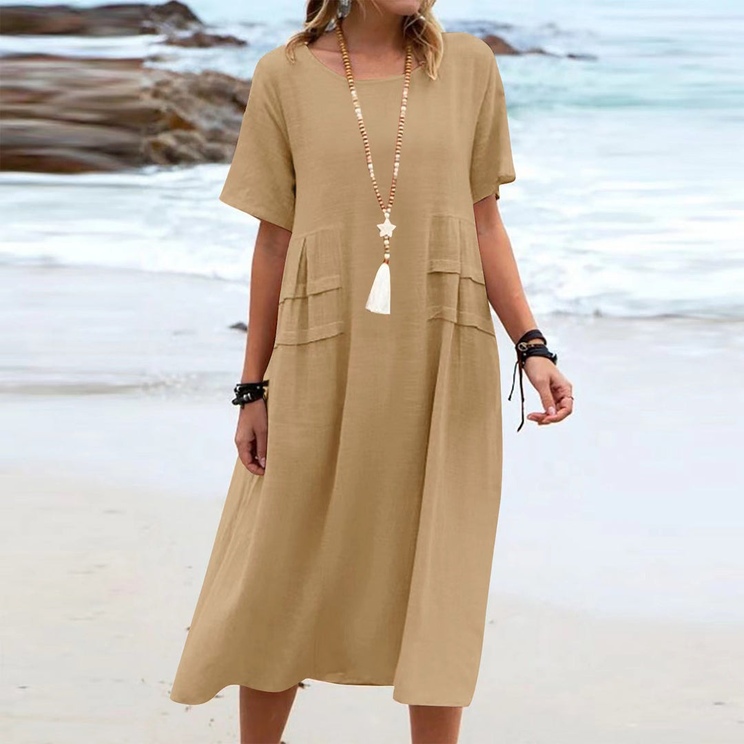 Vestito midi donna comodo in cotone lino traspirante, maniche corte, ideale per vacanze estive e look casual.