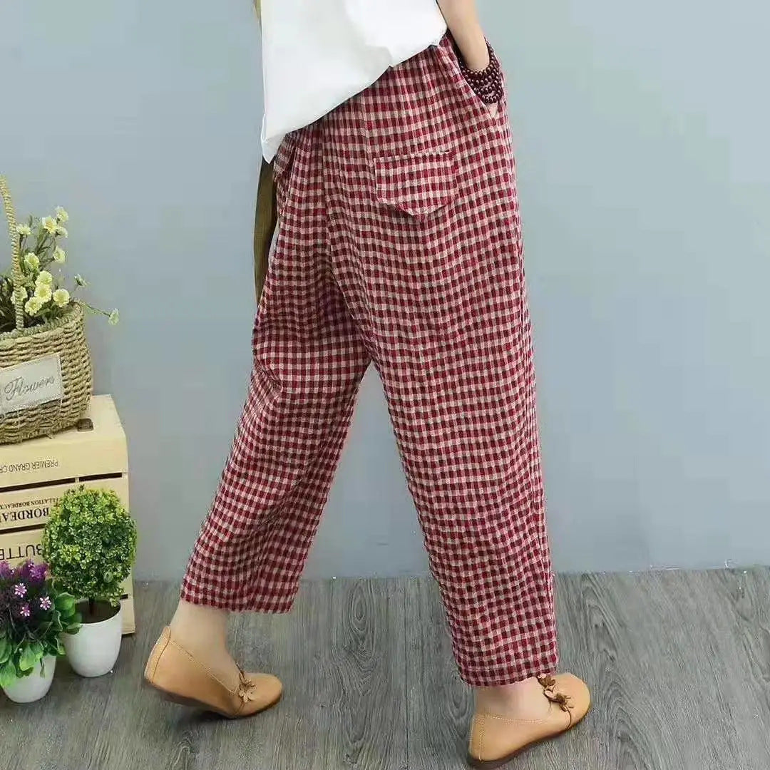 Pantaloni harem casual donna a vita alta a quadri, design ampio, confortevoli e alla moda per la primavera.