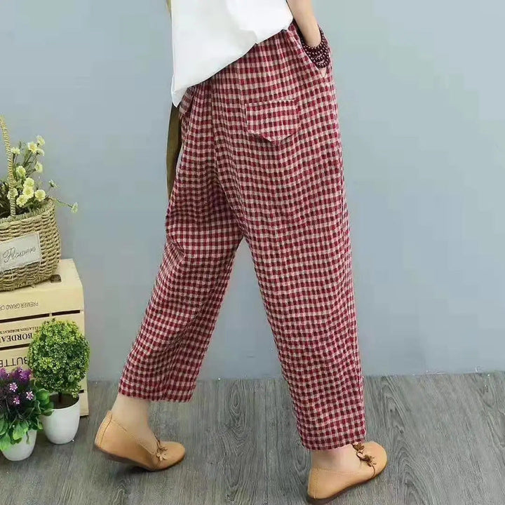 Pantaloni harem casual donna a vita alta a quadri, design ampio, confortevoli e alla moda per la primavera.