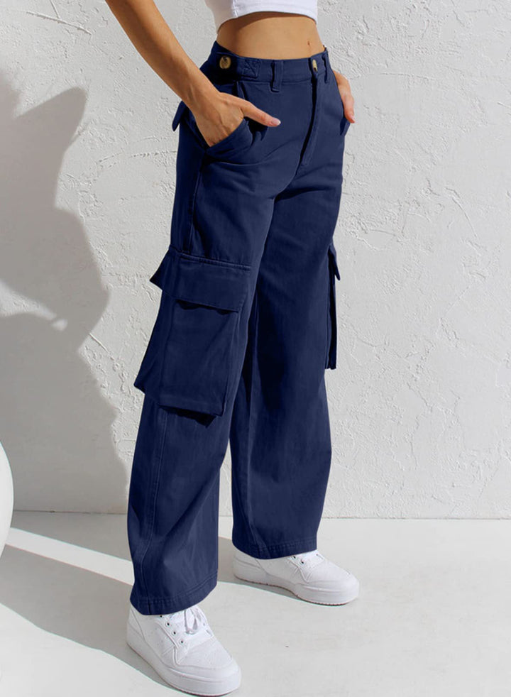 Jeans donna workwear ampi a vita bassa, con tasche multiple, ideali per comfort e stile pratico.