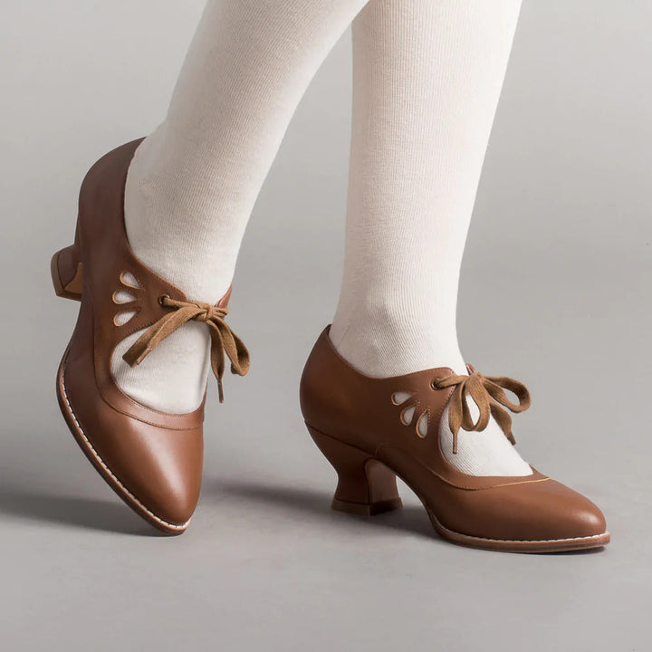 Moderne scarpe blu da donna con tacco, design elegante e comfort. Dotate di supporto plantare e suola antiscivolo.