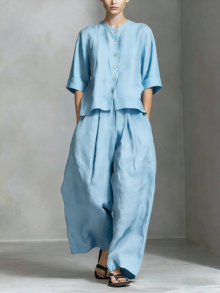 Camicia ampia da donna in lino cotone, parte di un completo due pezzi. Stile rilassato e comodo per l'estate.