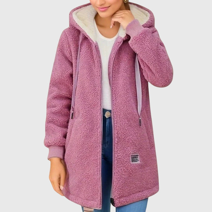 Giacca con cappuccio da donna, calda e morbida. Ideale come strato invernale, disponibile in taglie grandi.