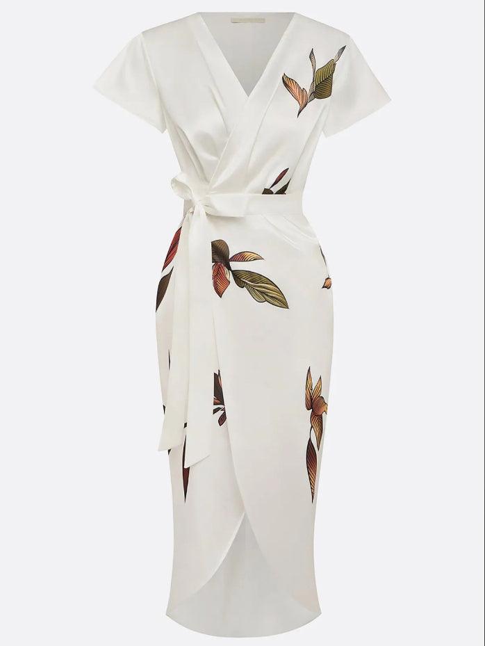 Abito midi floreale donna, stile incrociato e maniche corte a volant. Ottimo per un outfit estivo casual elegante.