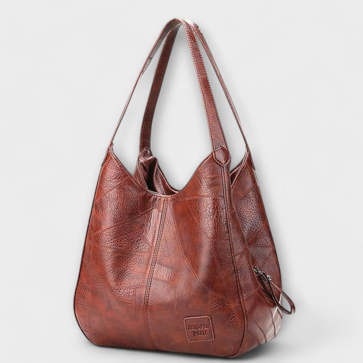 Borsa donna vintage effetto pelle marrone, elegante e versatile per uso quotidiano.