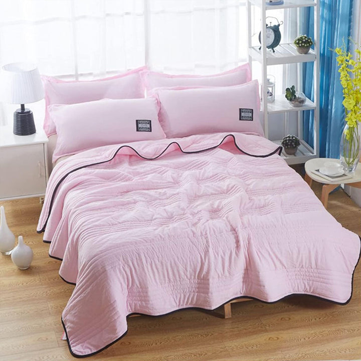 Coperta in microfibra leggera, rinfrescante e traspirante, perfetta per notti calde e biancheria letto.