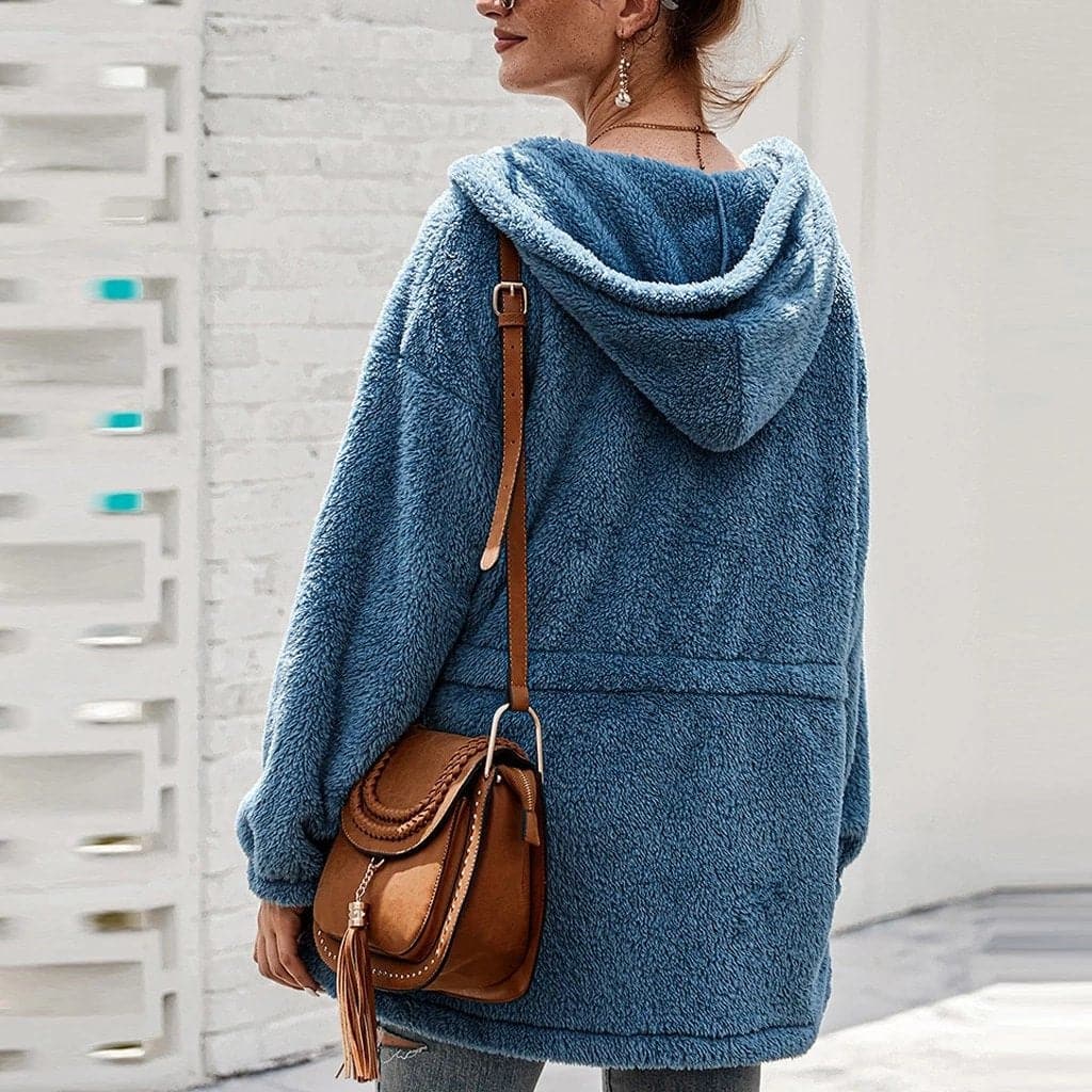 Giacca da donna oversize con cappuccio, calda e versatile. Ideale per look casual o più eleganti in inverno.
