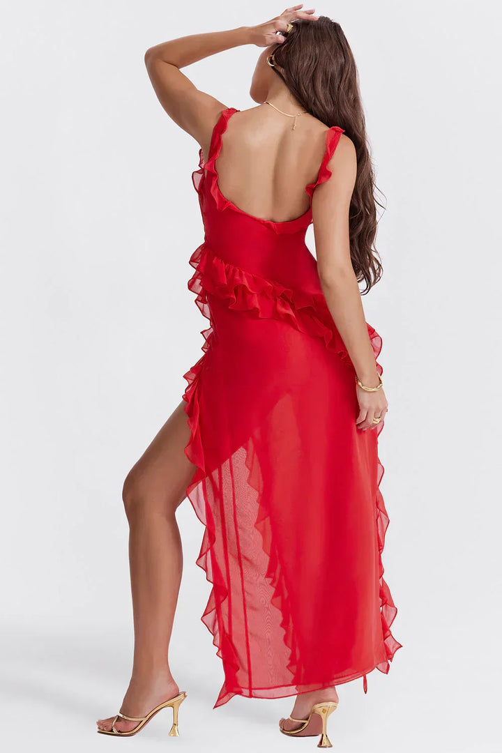 Seducente abito da sera lungo con spacco, perfetto per esaltare lo stile femminile e la figura.