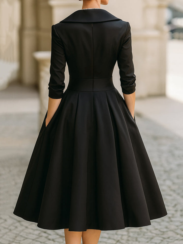 Moda femminile: abito midi plissettato A-line, stile vintage elegante per occasioni speciali.