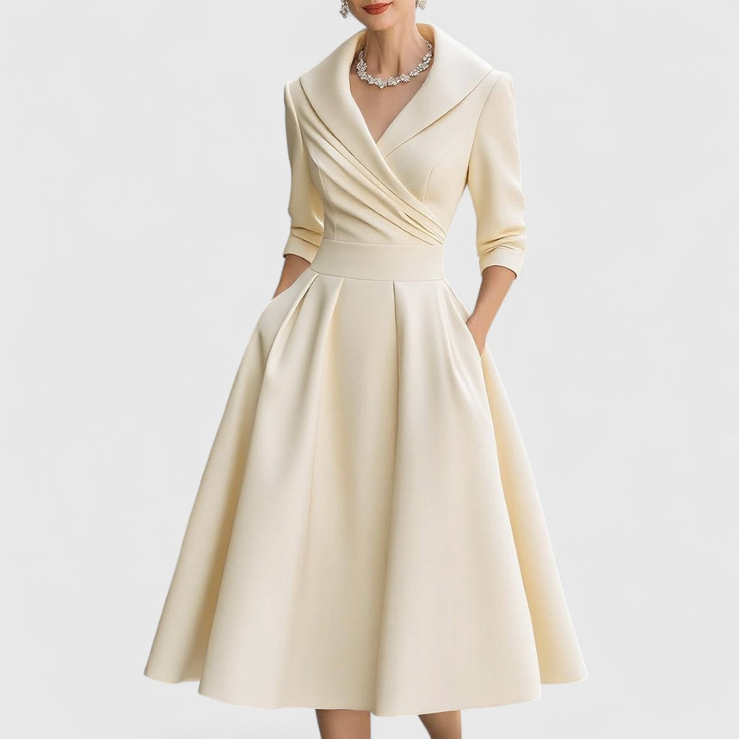 Abito midi donna con scollo a V e tasche, maniche 3/4, versatile ed elegante per il giorno e la sera.