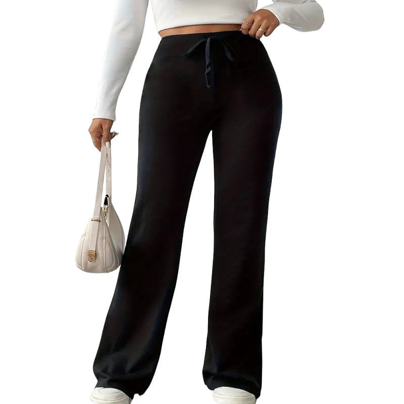 Pantaloni donna neri a vita alta e gamba ampia, eleganti e comodi per look casual o ufficio versatile.