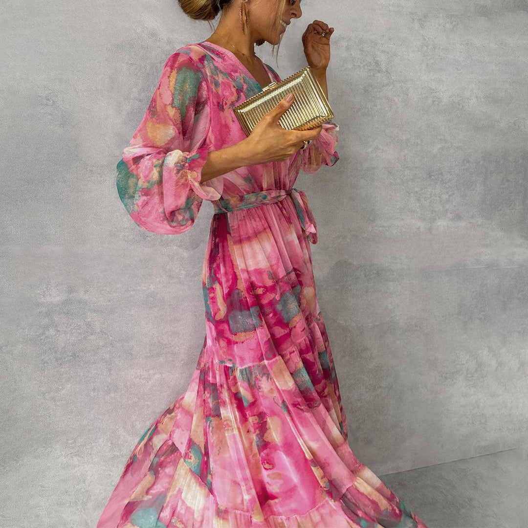 Abito floreale donna rosa con maniche lunghe, modello a portafoglio. Vestito lungo estivo per un tocco di eleganza.