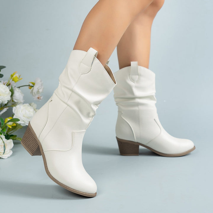 Stivali da donna ortopedici stile cowboy, con comfort e supporto per piedi attivi e dinamici.