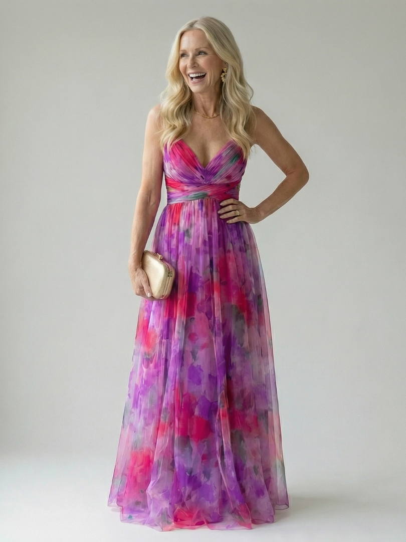 Abito donna lungo, incrociato in vita, tessuto fluido. Ideale per un look femminile e leggero estivo.