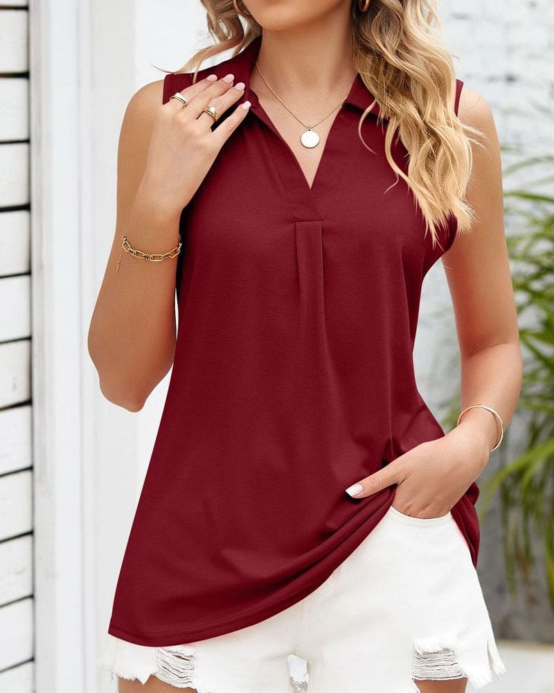 Blusa donna elegante, senza maniche, perfetta come top estivo o camicetta per l'ufficio.