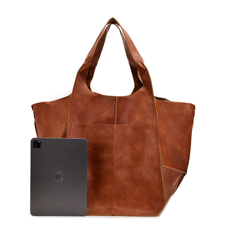 Elegante borsa a tracolla donna stile vintage, accessorio ideale per ogni stagione.