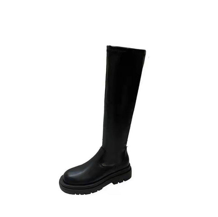 Eleganti stivali neri donna sopra il ginocchio, elasticizzati e con tacco medio. Scarpe comode ideali per l'autunno.