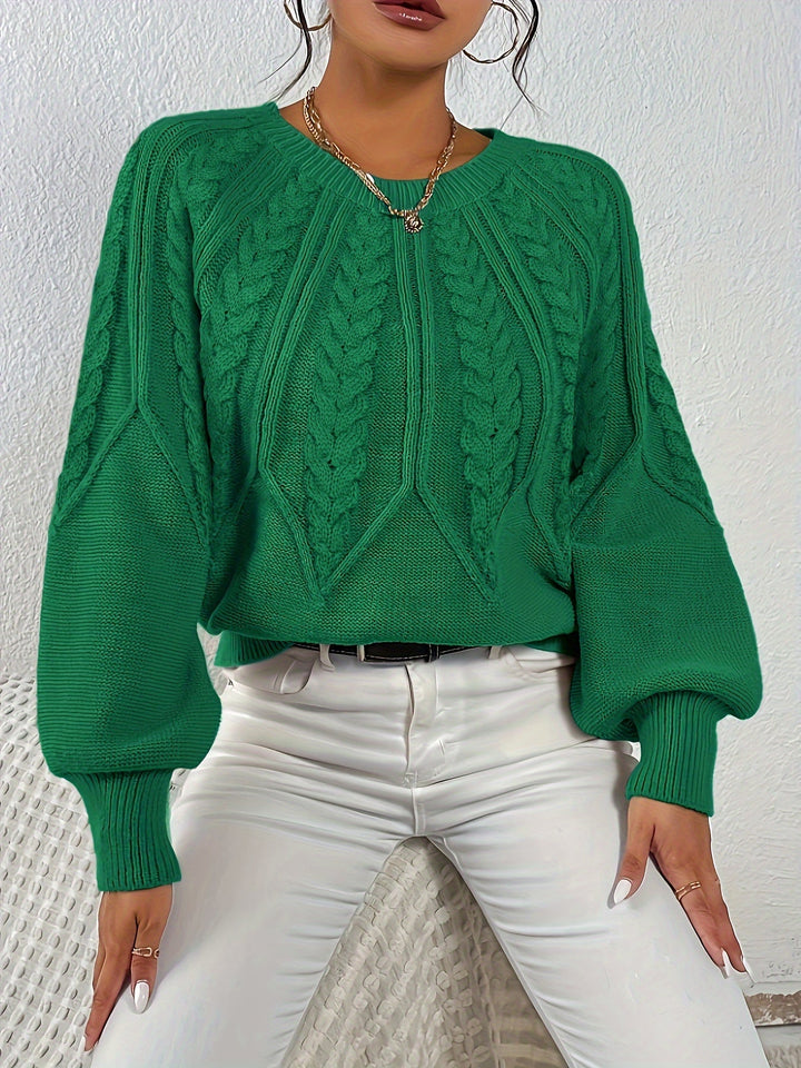 Maglia a trecce, maniche a palloncino. Il maglione donna ideale per un look casual.