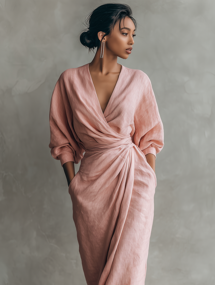 Abito lungo donna in lino, scollo a V profondo, maniche a pipistrello. Vestito elegante e confortevole.