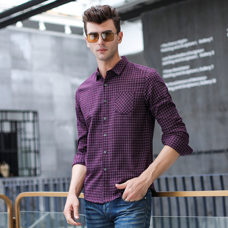 Elegante camicia da uomo a quadri, maniche lunghe e colletto a revers. Stile maschile perfetto per autunno e inverno.