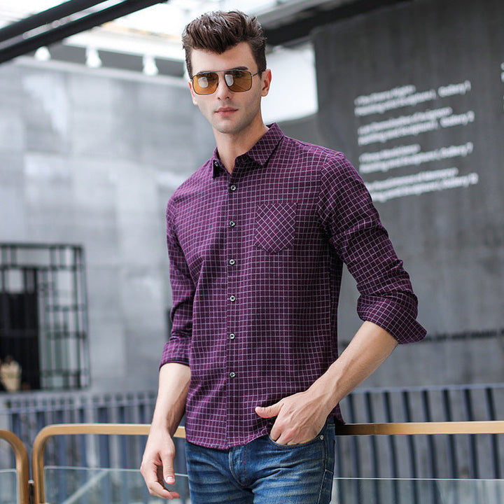 Elegante camicia da uomo a quadri, maniche lunghe e colletto a revers. Stile maschile perfetto per autunno e inverno.