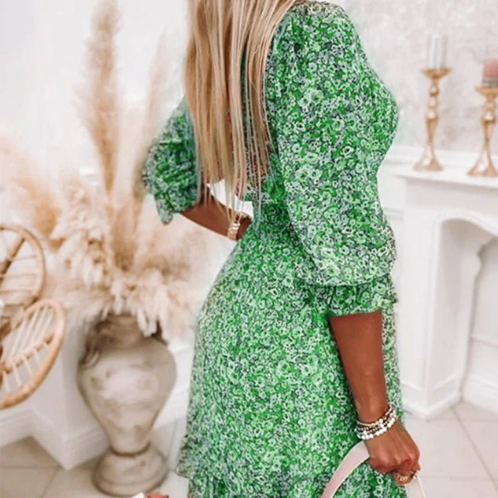Abito floreale midi, perfetto per la donna che cerca un vestito casual ed elegante per la primavera e le feste estive.