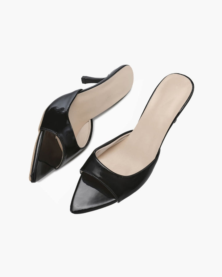 Moda scarpe donna: sandali eleganti slip-on con tacco kitten heel, versatile e chic.