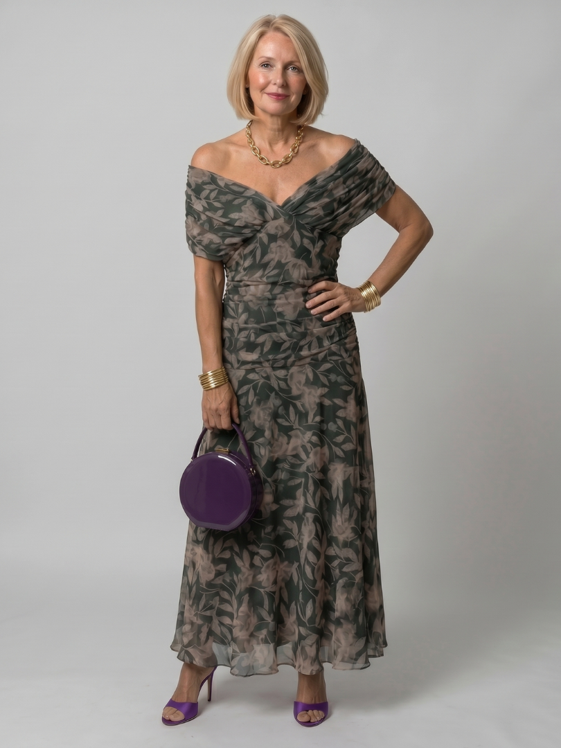 Look elegante: abito midi fluido con spalle scoperte, romantico e fresco per la donna moderna.