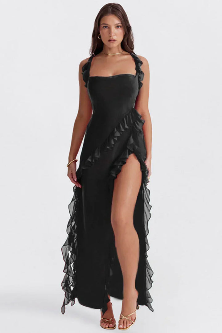 Abito elegante con spacco, ideale per cene formali o eventi speciali con un tocco glamour.