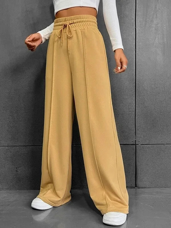 Pantaloni eleganti ma comodi, a gamba larga per donna, ideali per outfit versatili e rilassati.