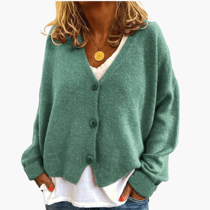 Cardigan donna con bottoni, morbido e versatile, ideale per le mezze stagioni.