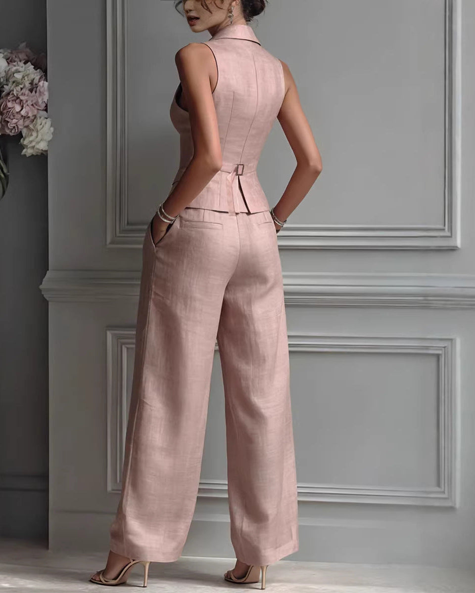 Completo donna due pezzi: gilet moderno e pantaloni dritti per un outfit elegante e professionale, stile versatile.