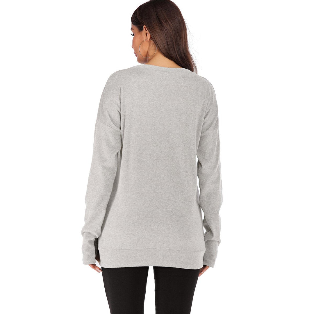 Abbigliamento femminile: maglione pullover comodo a tinta unita, stile casual autunnale.