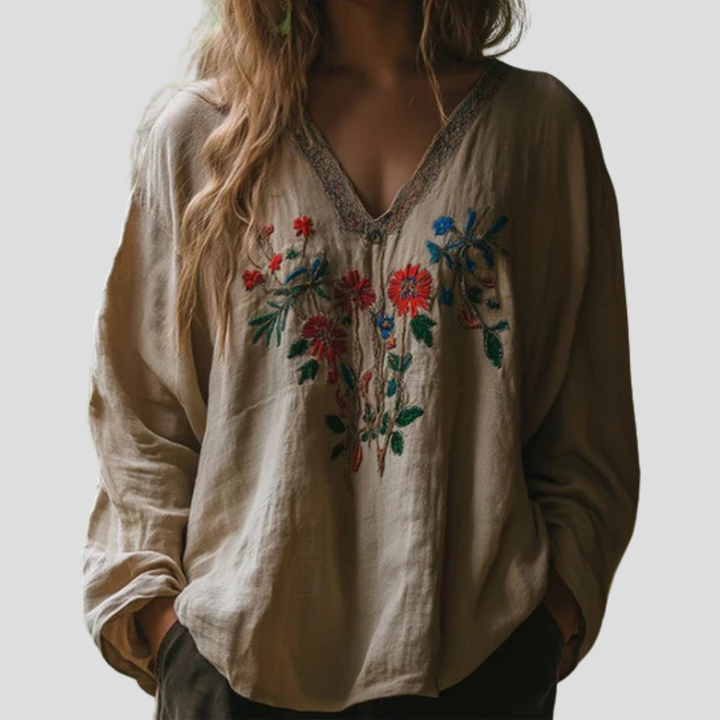 Camicetta ricamata da donna, leggera e raffinata. Top ideale per look primaverili ed estivi, elegante e casual.