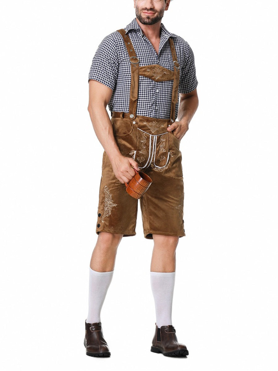 Camicia a quadri e bretelle su Lederhosen, componenti essenziali del completo tradizionale bavarese Oktoberfest uomo.