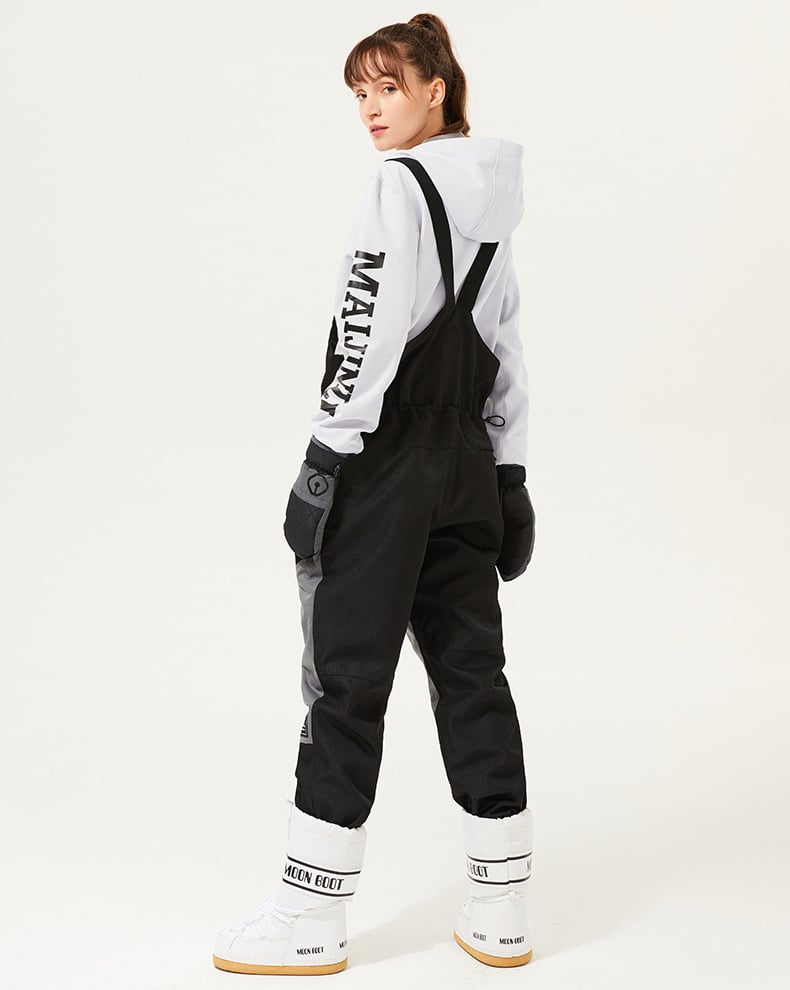 Pantaloni sci unisex regolabili per comfort e protezione su neve. Caldi, resistenti e impermeabili per sport invernali.