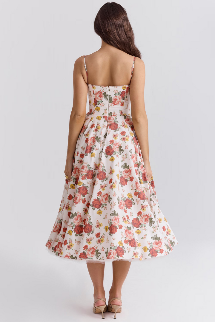 Abito midi donna dal movimento fluido, elegante e confortevole, perfetto per primavera/estate.