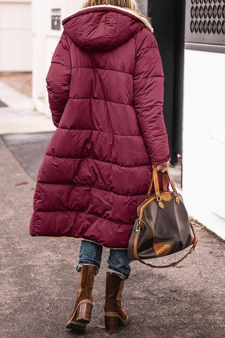 Comodo e caldo cappotto invernale donna reversibile. Elegante giacca lunga, ideale per il freddo.