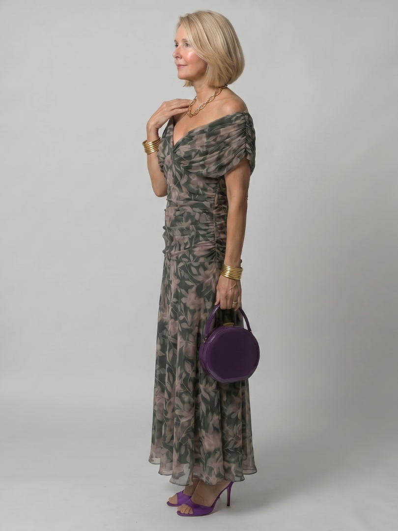 Abito midi estivo per donna, romantico e con spalle scoperte, ideale per occasioni speciali.