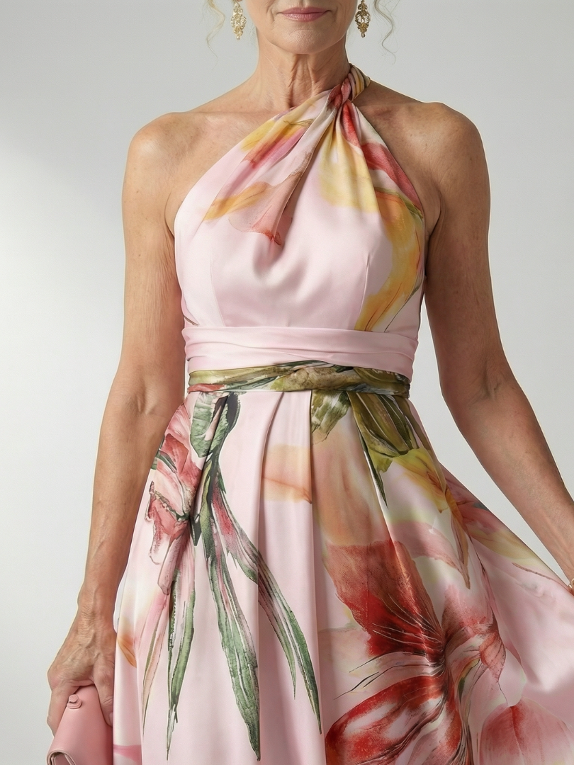 Leggero abito floreale da donna, maxi lunghezza, perfetto per il massimo comfort estivo.