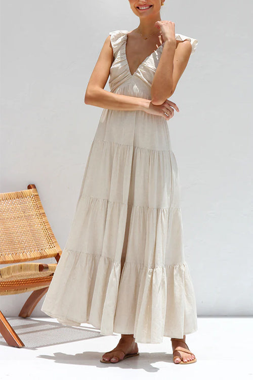 Abito estivo lungo da donna, fresco e leggero, con scollo a V e romantiche balze. Ideale per la stagione calda.