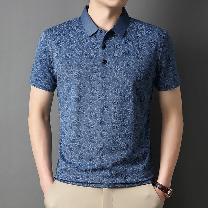 Polo floreale da uomo in diverse tonalità di grigio, slim fit, ideale per l'abbigliamento estivo.