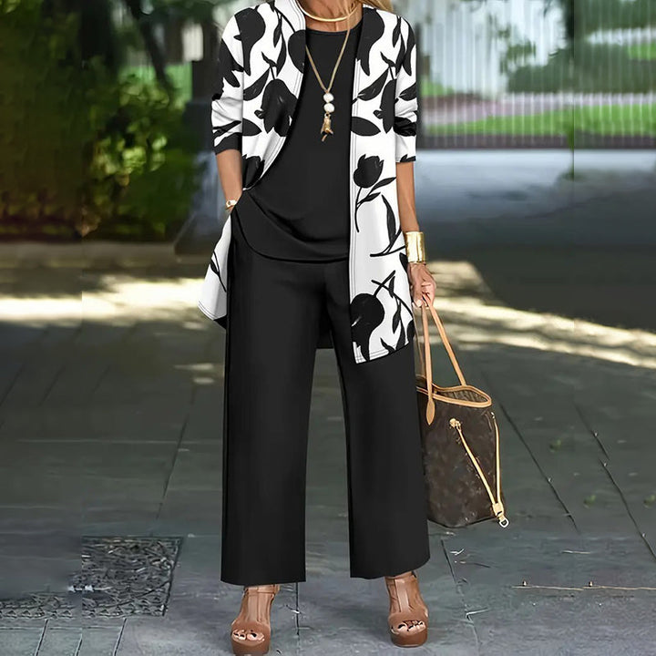 Completo donna elegante tre pezzi con motivo floreale, perfetto per occasioni speciali o casual chic.