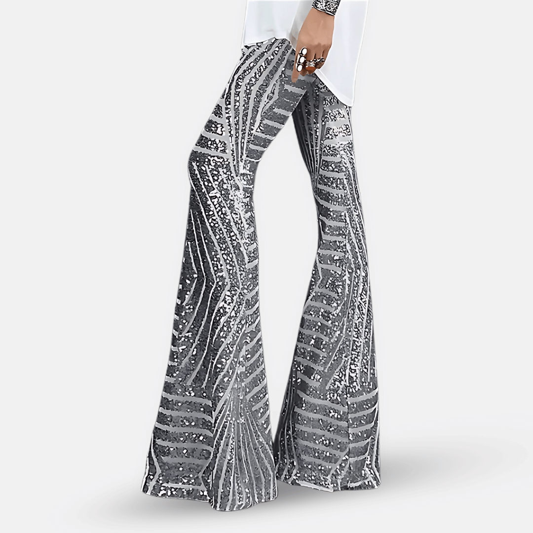 Eleganti pantaloni donna a zampa con paillettes brillanti e vita alta, ideali per un look serale glamour.
