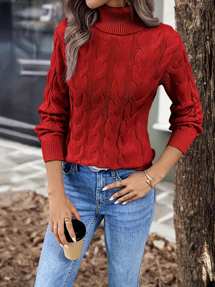 Maglione donna elegante a trecce, collo alto che avvolge con morbidezza.