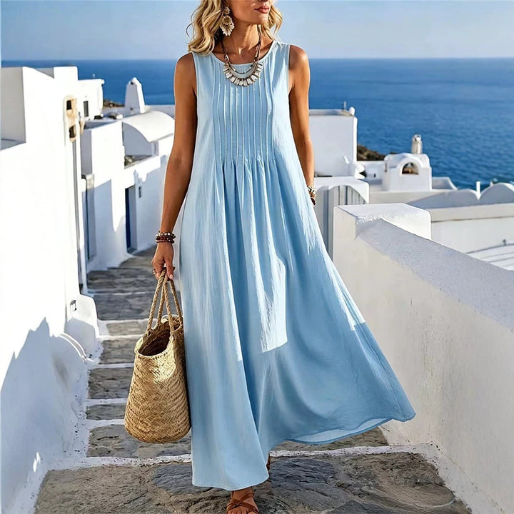 Abito casual donna ampio e confortevole, con collo rotondo. Vestibilità rilassata per ogni giorno d'estate.