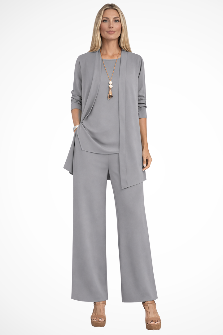Tailleur donna tre pezzi, abbigliamento formale. Completo elegante con cardigan e pantaloni larghi per stile raffinato.
