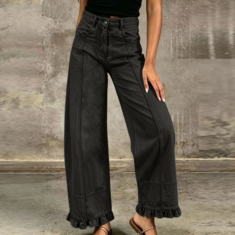 Pantaloni donna streetwear a vita alta, con gamba larga e vestibilità ampia, look trendy.